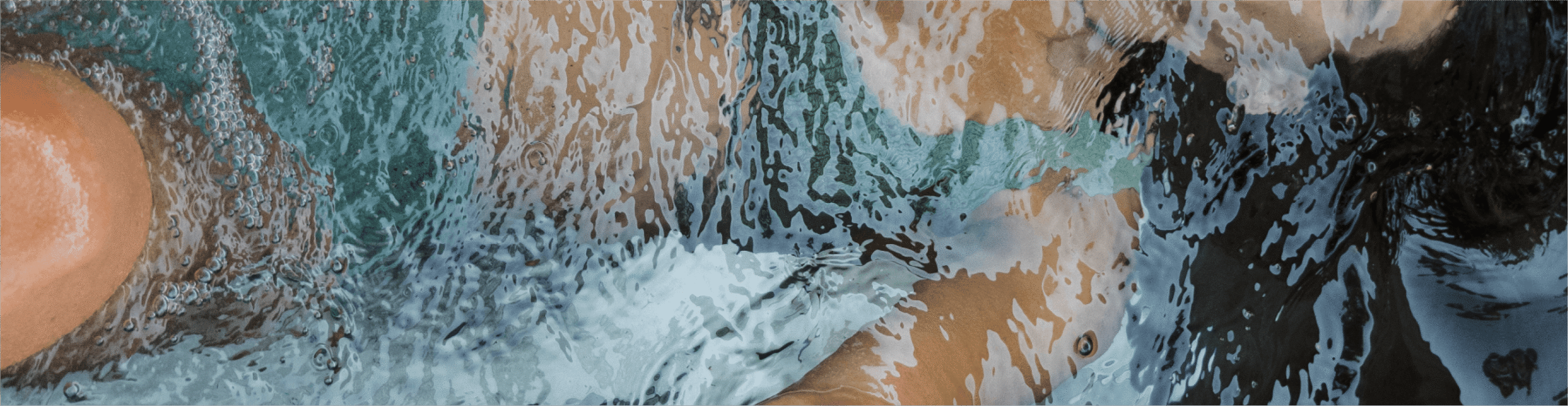 Woman submerged in a BlueCube Cold Plunge Ice Bath