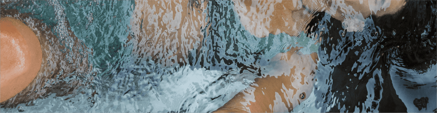 Woman submerged in a BlueCube Cold Plunge Ice Bath
