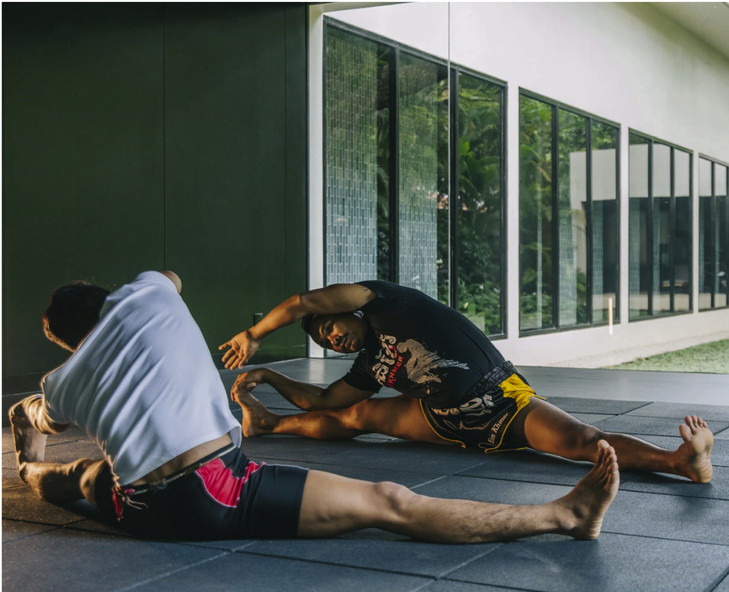 Men Stretching at A Commercial BlueCube Cold Plunge Ice Bath location