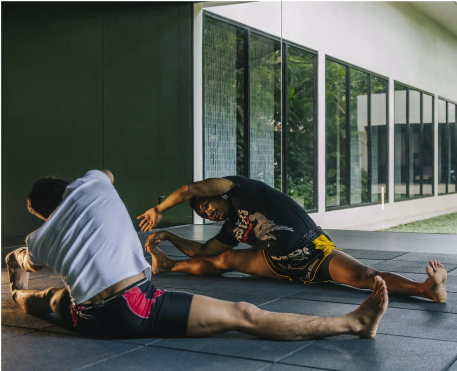 Men Stretching at A Commercial BlueCube Cold Plunge Ice Bath location