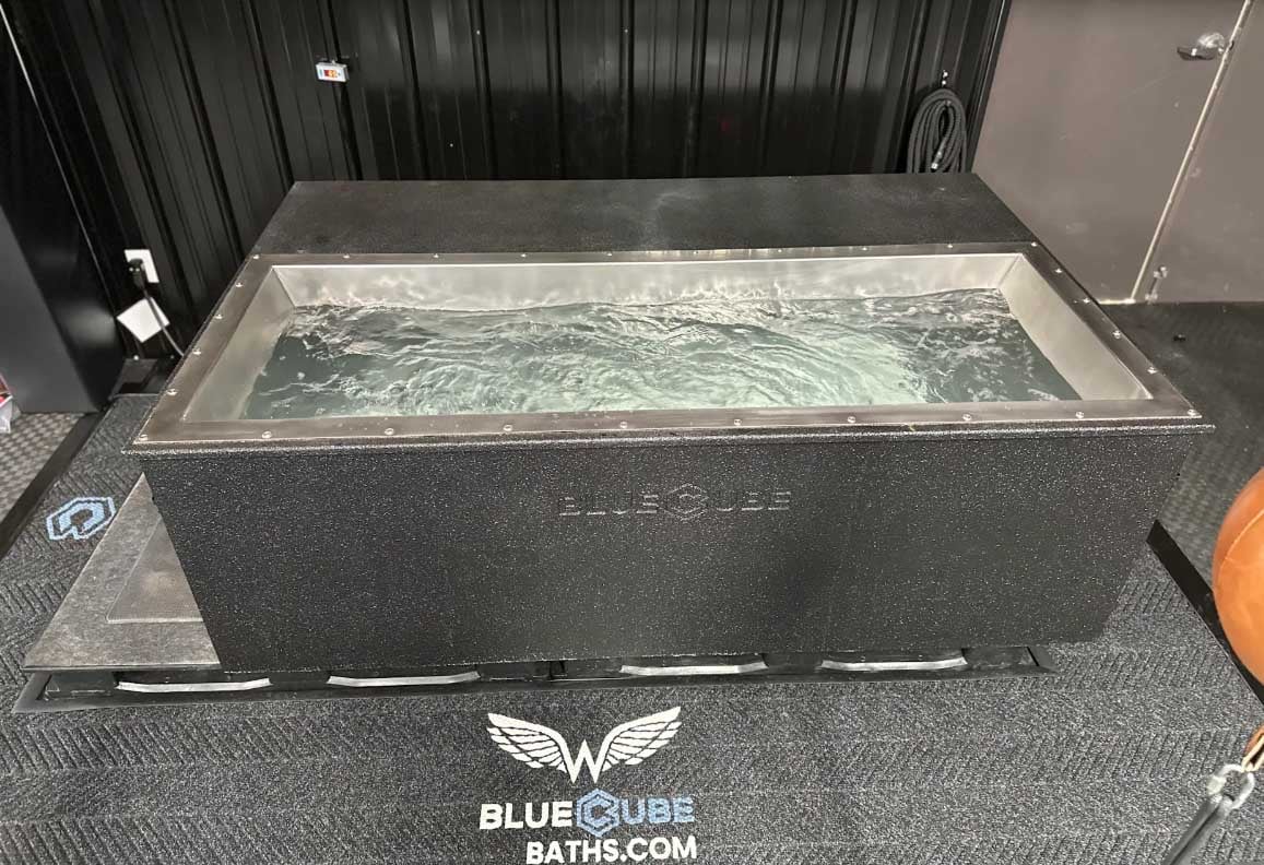 Overhead view of a BlueCube C3 black cold plunge with stainless steel basin at Team Onward