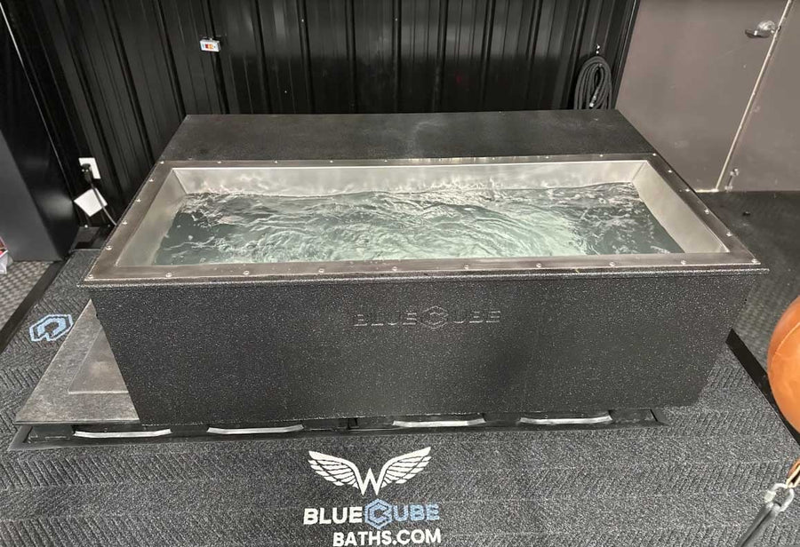 Overhead view of a BlueCube C3 black cold plunge with stainless steel basin at Team Onward