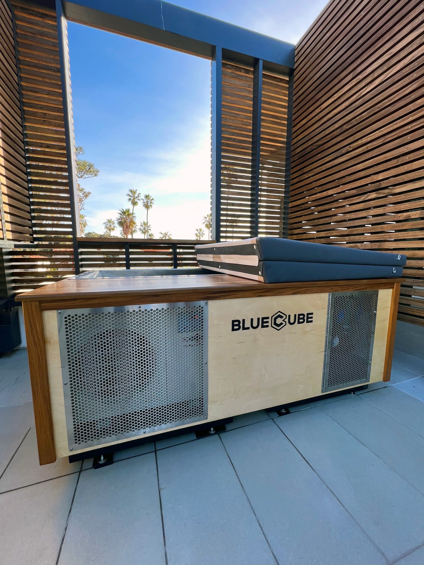 BlueCube Cold Plunge Tub: Malibu 66" custom teak deck and trim with insulative spa cover at a beachfront residence in San Diego, CA.   