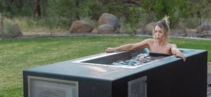 CoreChill cold plunge tub with woman at 37 degrees for 5 minutes in a home backyard. 