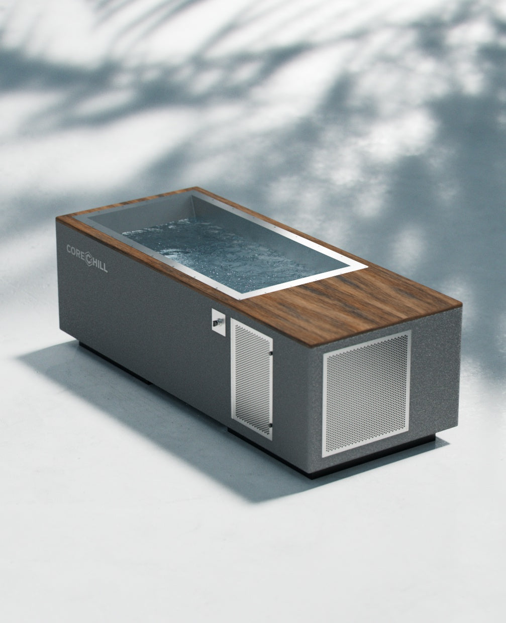 CoreChill³ cold plunge tub In Grey with Walnut Top