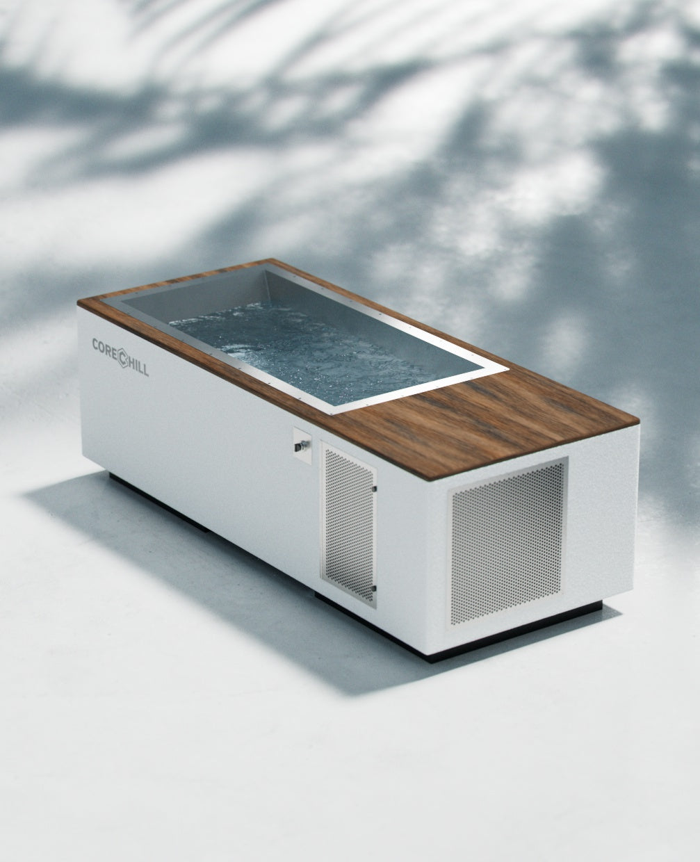 CoreChill³ cold plunge tub In White with dark wood top