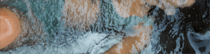 Woman submerged in a BlueCube Cold Plunge Ice Bath