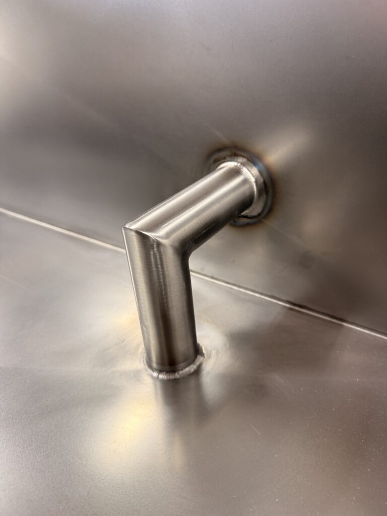 Up close photo of BlueCube Stainless Steel Welded Foot Pegs for uce bath cold plunge tub