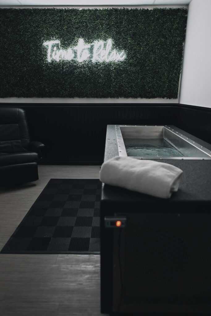 BlueCube C2 black cold plunge and recovery lounge at Fire Ice and Moore Wellness Studio in Southern Pines, NC
